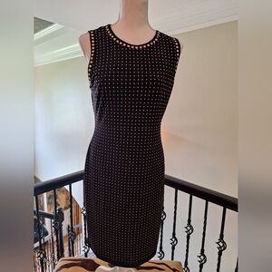 Carmen black dress with gold studs on front and back fully lined